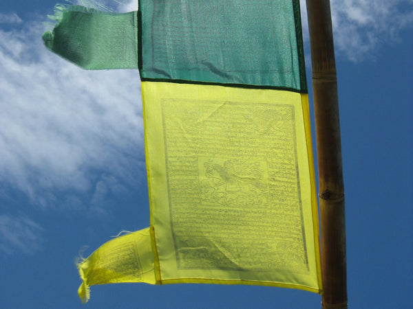 Vertical Tibetan Prayer Flags displaying the Windhorse "Victory Over Obstacles"