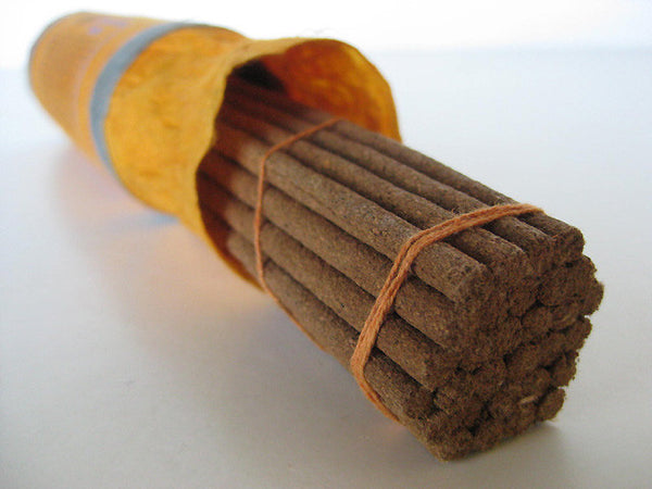 Saffron incense sticks with incense burner