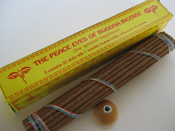 The Peace Eyes of Buddha Incense comes with a small wooden incense burner