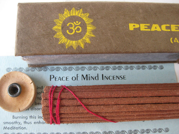 Peace of Mind Incense comes with a small wooden incense burner