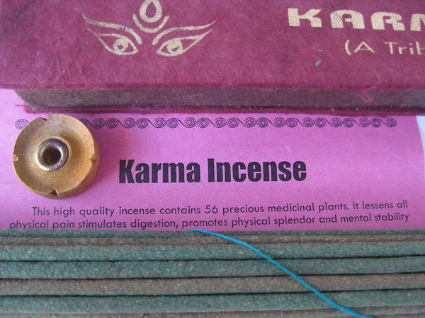 Karma incense comes with a small wooden incense burner